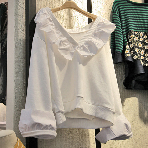 Modern női blúz V-nyakkal, fehér színben