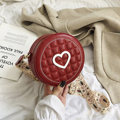 Kör alakú női táska hosszú füllel - két modell