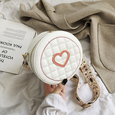 Kör alakú női táska hosszú füllel - két modell