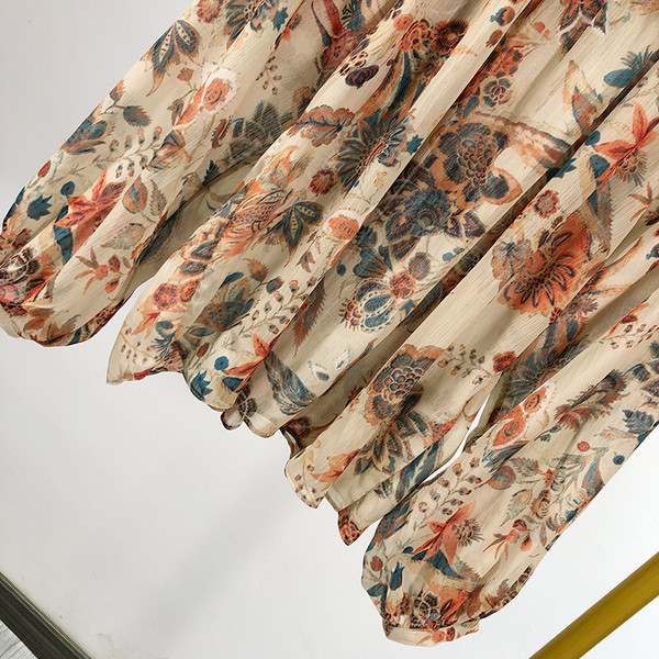 Női sifon blúz hosszú ujjal, virágmintával