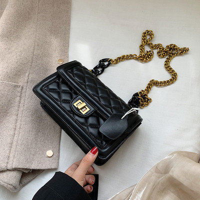 Modern női bőr táska fém rögzítéssel