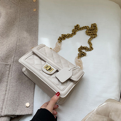 Modern női bőr táska fém rögzítéssel