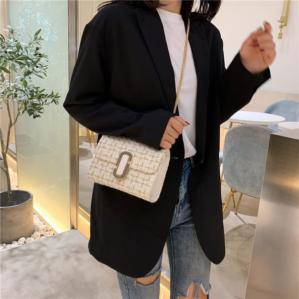 Stílusos női táska fém díszítéssel, négy színben