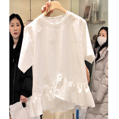 Női blúz O-nyakú aszimmetrikus modellel fehér és fekete színben