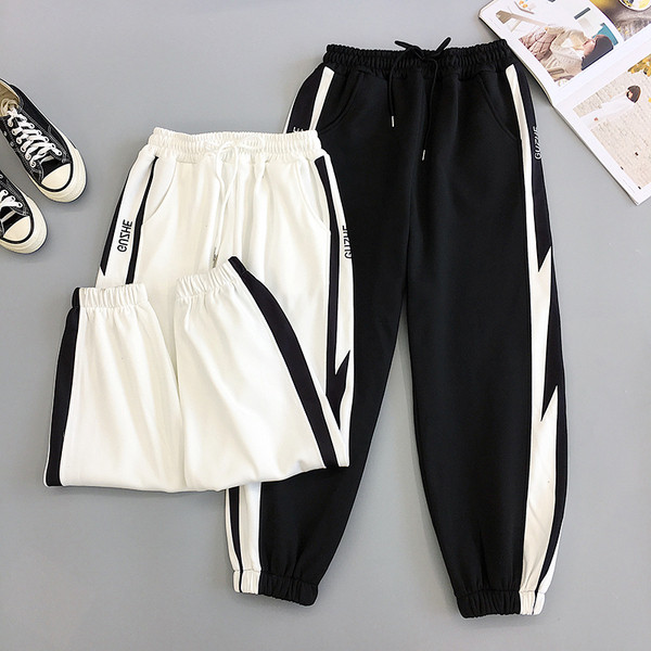 Pantaloni sport și casual de damă în alb și negru