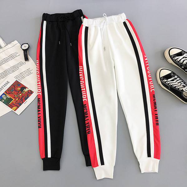 Női alkalmi nadrág fekete-fehér színben