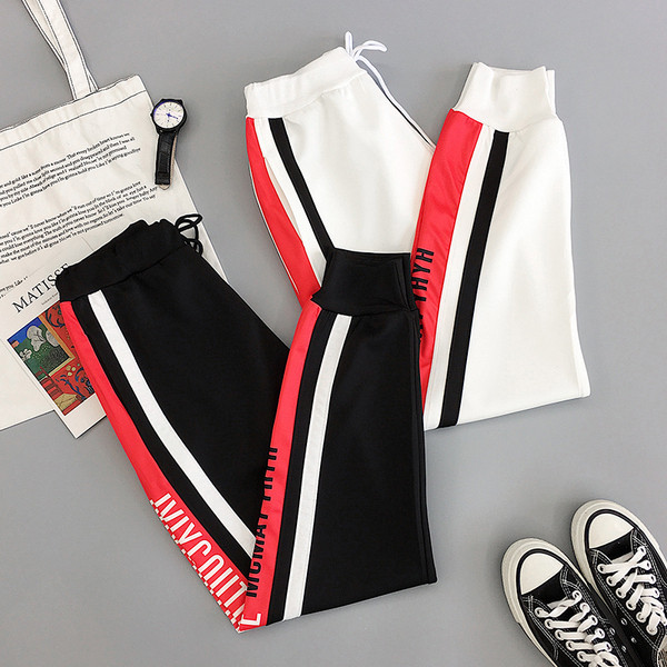 Női alkalmi nadrág fekete-fehér színben