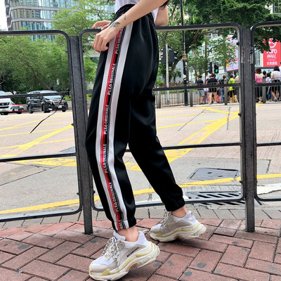 Pantaloni sport de damă alb-negru cu margini