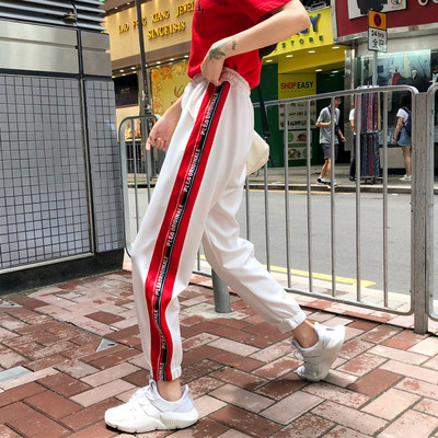 Pantaloni sport de damă alb-negru cu margini