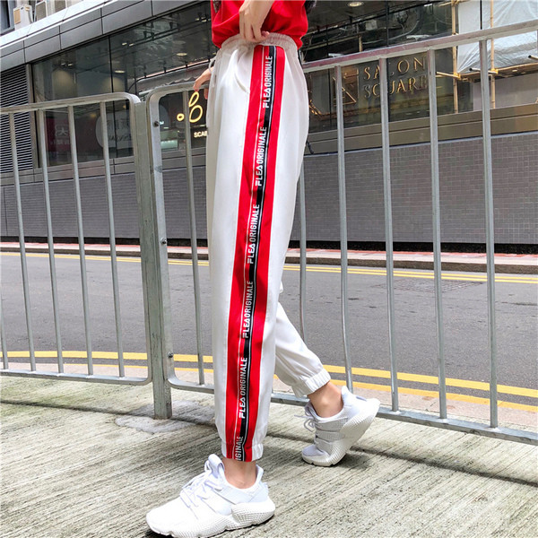 Pantaloni sport de damă alb-negru cu margini