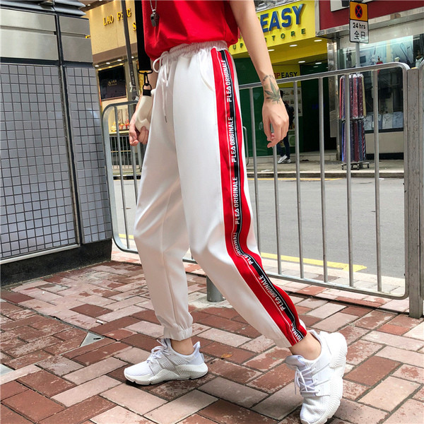 Pantaloni sport de damă alb-negru cu margini