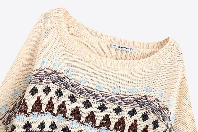 Rövid, bézs színű, hosszú ujjú pulóver mintával