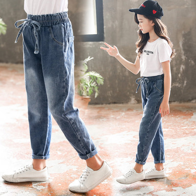 Casual children`s jeans for girls with elastic waist