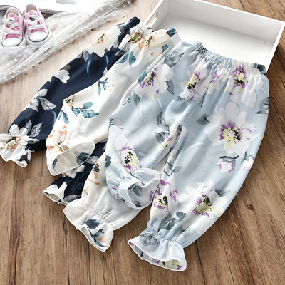 Модерни детски панталони за момичета с флорален десен в три цвята