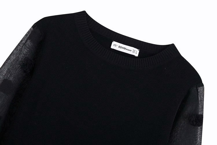 Elegáns női pulóver átlátszó ujjakkal, fekete színben