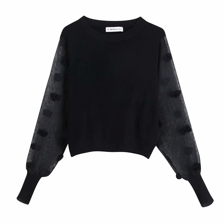 Elegáns női pulóver átlátszó ujjakkal, fekete színben