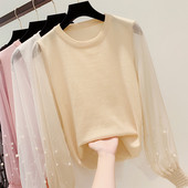 Különböző színekben gyöngyökkel díszített modern női pulóver