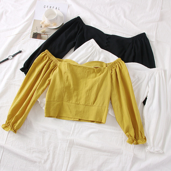 Modern női blúz csupasz vállval, fehér, fekete és sárga színben