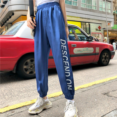 Női nadrág kék színben - felirattal, magas derékkal