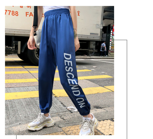 Női nadrág kék színben - felirattal, magas derékkal