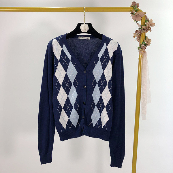 Modern női mellény kék gombokkal