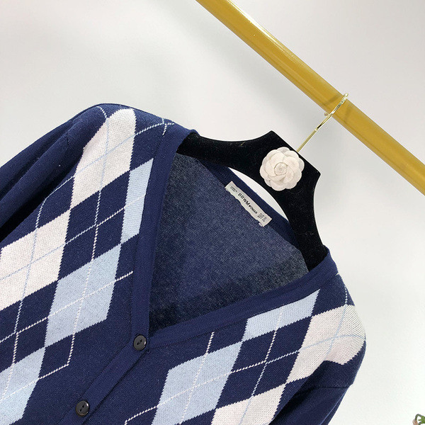 Modern női mellény kék gombokkal