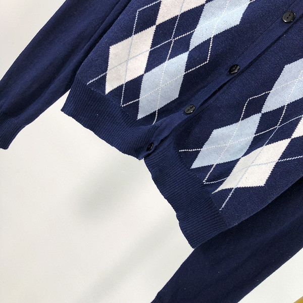 Modern női mellény kék gombokkal