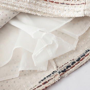 Stílusos női szoknya magas derékkal, fekete-fehér színben