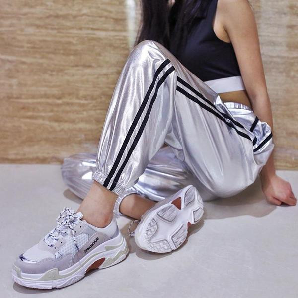 Modern női nadrág - széles modell szegéllyel