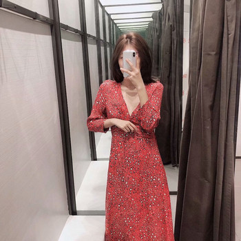 Rochie lunga cu decolteu si crapata