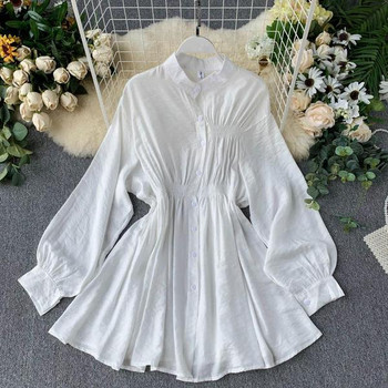 Aktuális női ruha szabású modell hosszú ujjú fekete-fehér színben