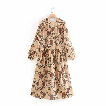 Modern női ruha virágos motívumokkal és V-nyakkivágású modellel