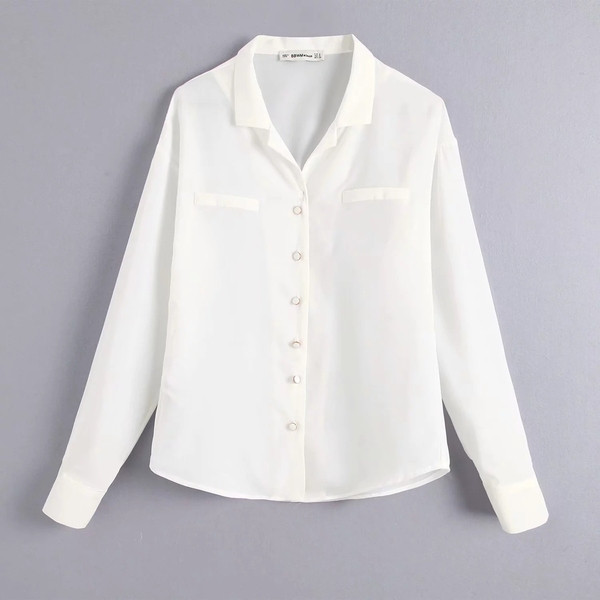 Stílusos női ing, fehér gombokkal