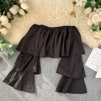 Bluză de damă actuală cu mâneci căzute în alb-negru