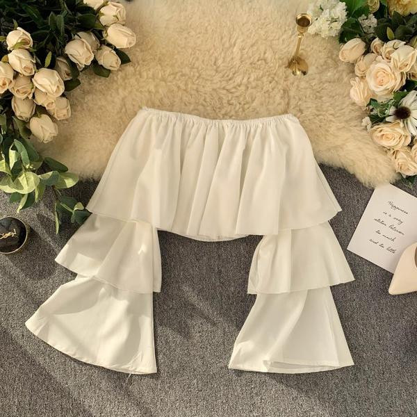 Bluză de damă actuală cu mâneci căzute în alb-negru