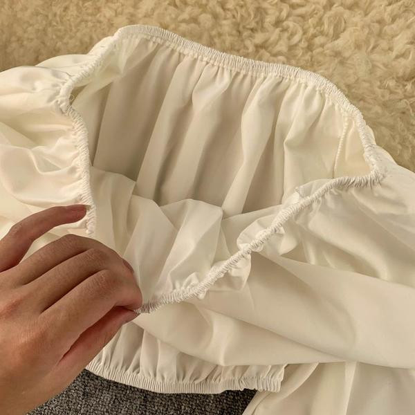 Bluză de damă actuală cu mâneci căzute în alb-negru