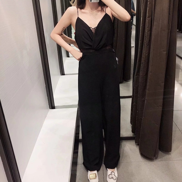 Elegáns női overall vékony pántokkal, fekete színben