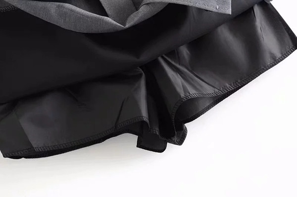 Stílusos női szoknya szürke és fekete színben