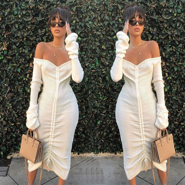 Alkalmi női ruha ejtett ujjakkal és megkötős fehér színben