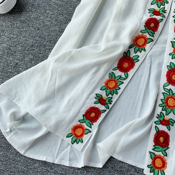 Rochie elegantă de damă cu broderie în alb și negru