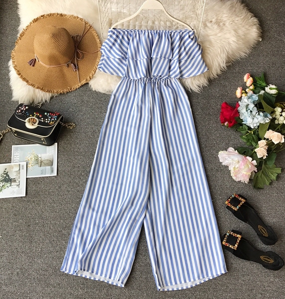 Salopetă de damă modernă în carouri de culoare albastră