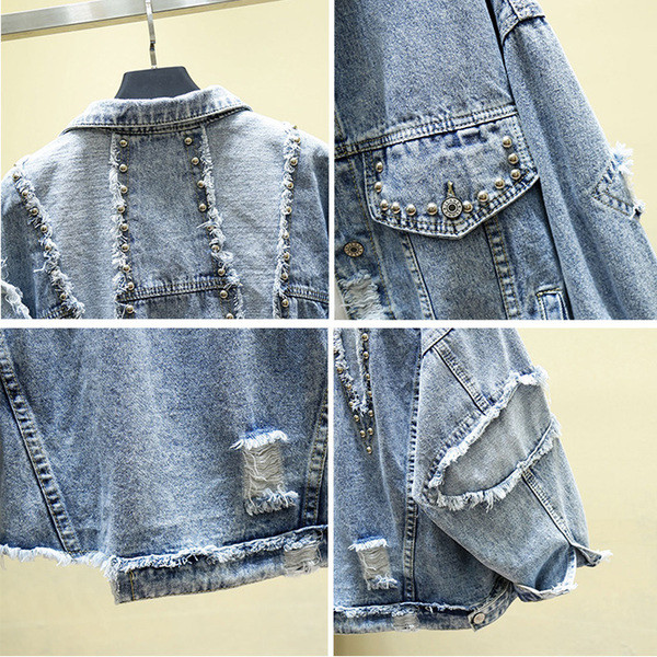 Széles modell farmerdzseki fém elemekkel, szakadt motívumokkal