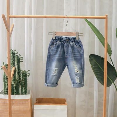 Blugi moderni pentru copii cu motive rupte in albastru