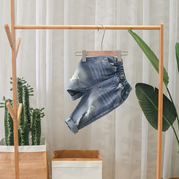 Blugi moderni pentru copii cu motive rupte in albastru