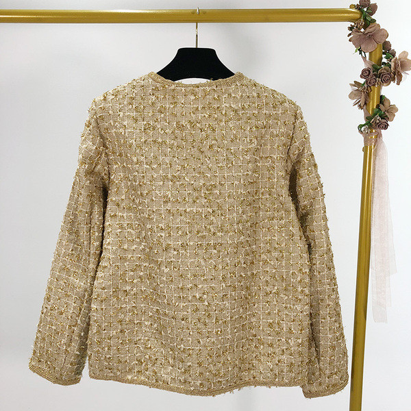 Női elegáns barna kabát és zsebek