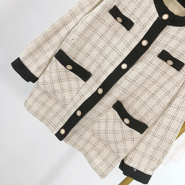 Női kockás mellény gombokkal