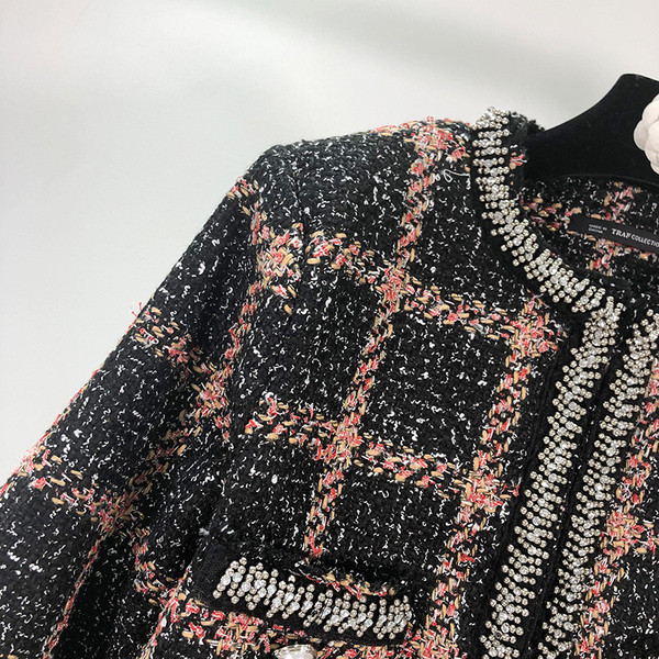 Elegáns női kockás kabát