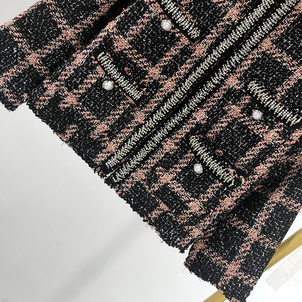 Elegáns női kockás kabát