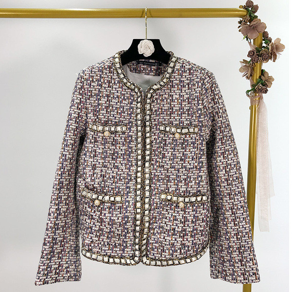 Elegáns kabát gyöngyház gombokkal