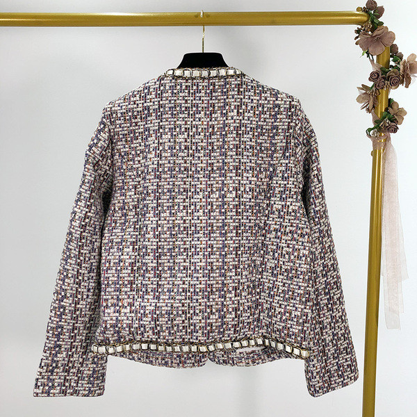 Elegáns kabát gyöngyház gombokkal